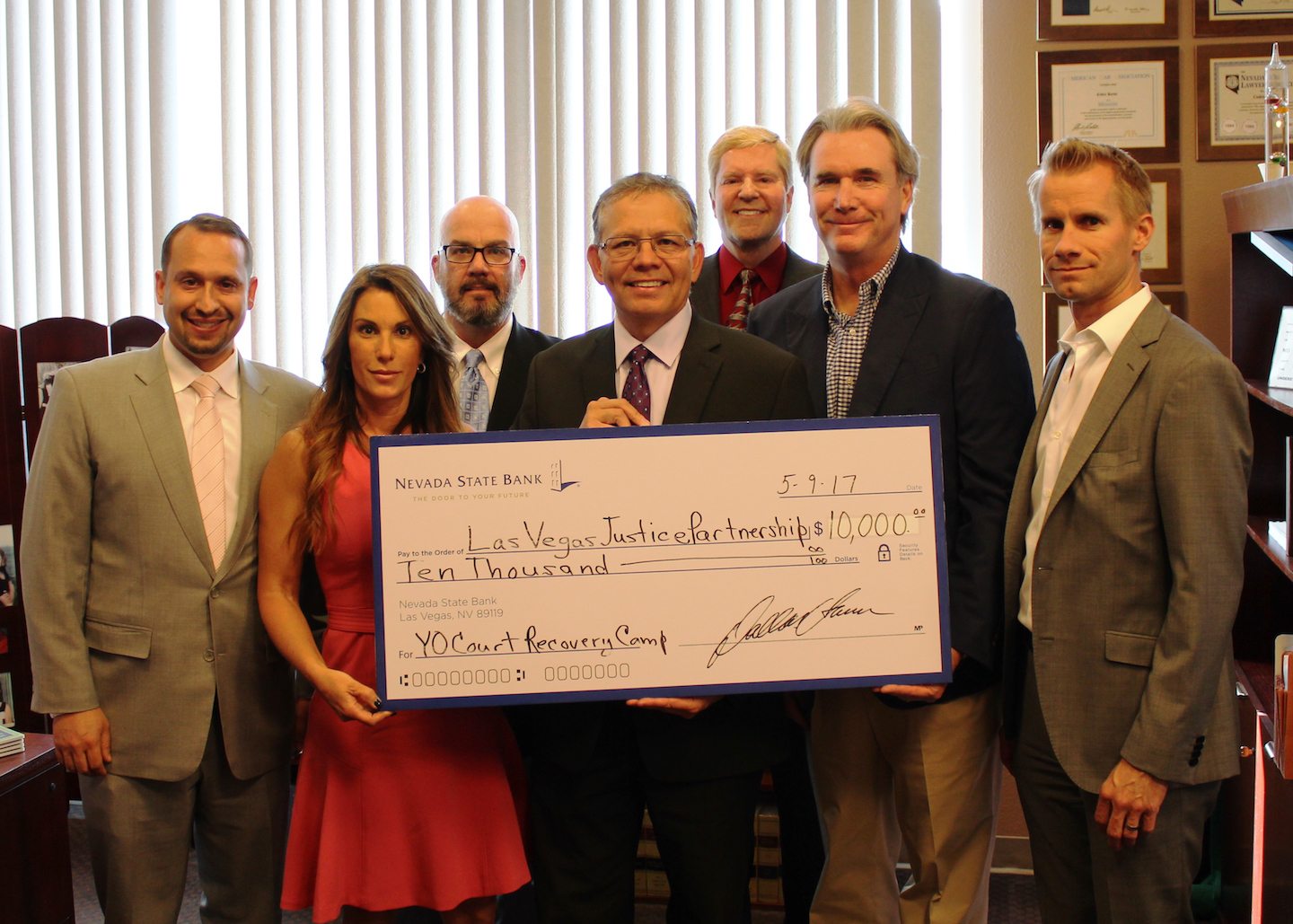 Nevada State Bank presents a $10,000 check as the first donation to the Las Vegas Justice Partnership.