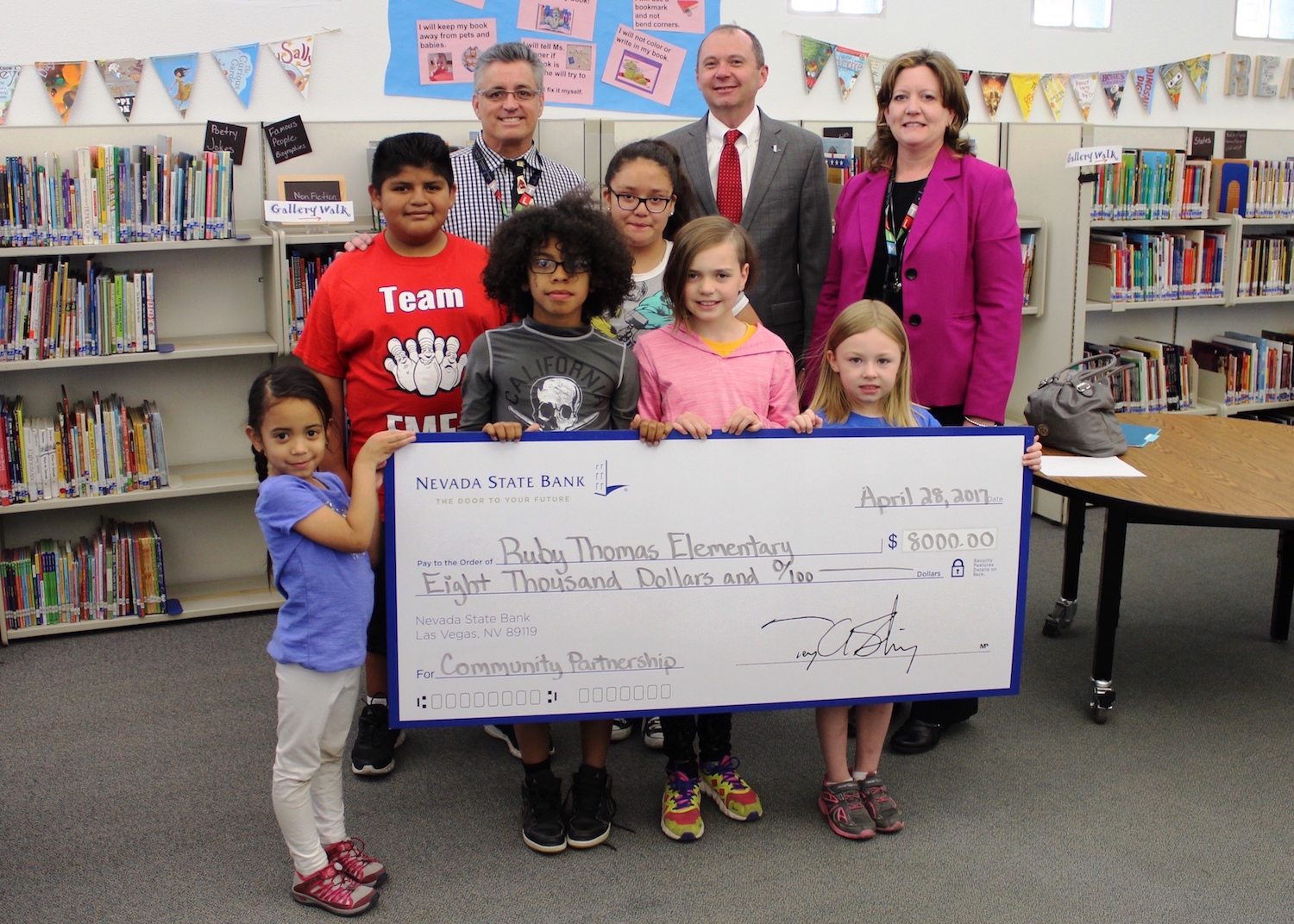 Nevada State Bank presented a check for $8,000 to Ruby Thomas Elementary School in celebration of Teach Children to Save, to support their education efforts